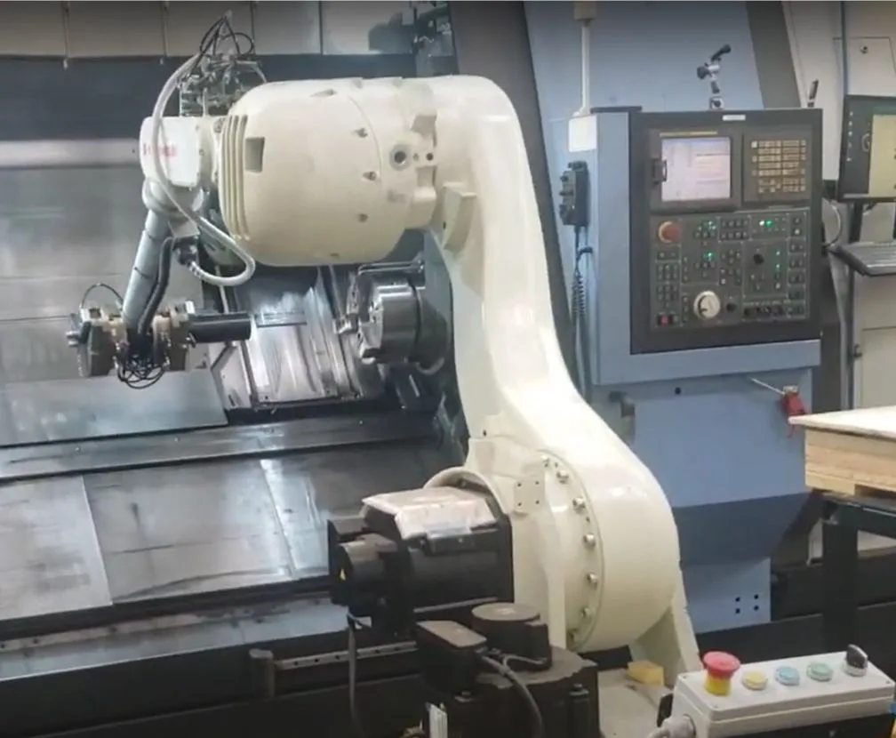 Easy-HMI robot loader arm tending a CNC machine
